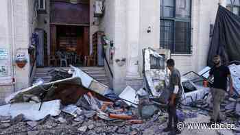 Thousands flee West Bank refugee camp after massive Israeli military raid kills 10