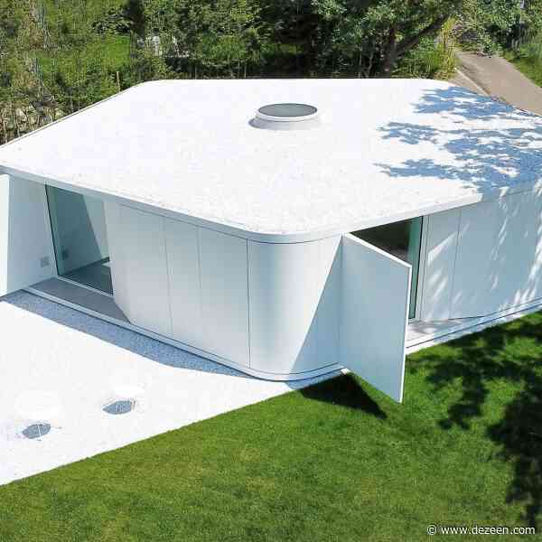 Pinwheel house by JM Architecture resembles "a white pebble in the landscape"