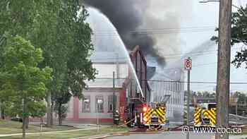 Fire crews douse Point Douglas blaze as smoke pours from building