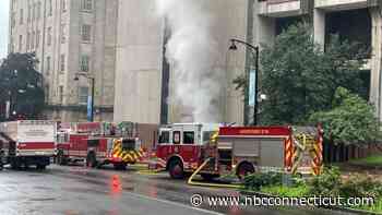 Crews battle fire at high-rise building in downtown Hartford