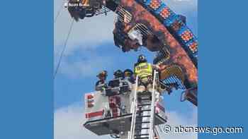 WATCH:  Roller coaster riders stranded upside down rescued