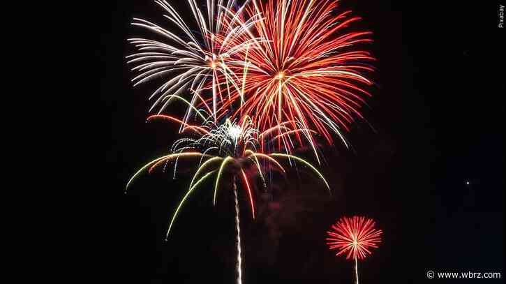 Fireworks display cut short due to small fire on launching barge