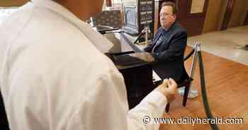 From the heart: A retired music professor and cardiologist are bringing joy to Edward Hospital