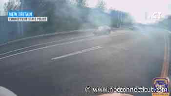 Must-see video: State trooper almost hit by two cars that slid on wet pavement in New Britain