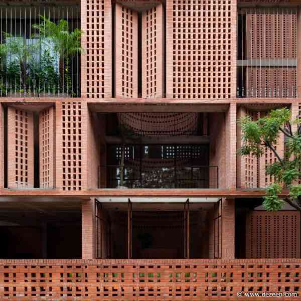 Perforated brickwork wraps Premier Office in Vietnam by Tropical Space