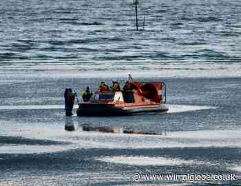 Hoylake hovercraft crew helps rescue stranded  dog walker