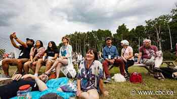 'If you like the sound, head towards it': Rain dampens opening night but fans ready for Winnipeg Folk Fest