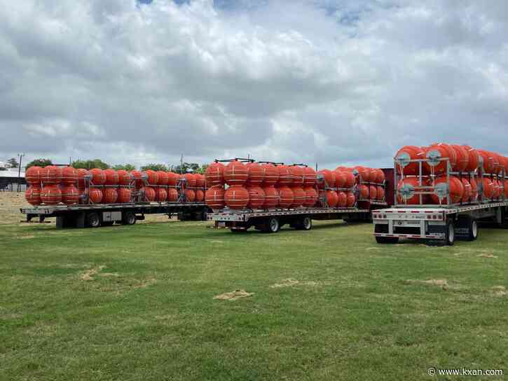 Texas begins installing buoy barrier to deter migrants on Rio Grande