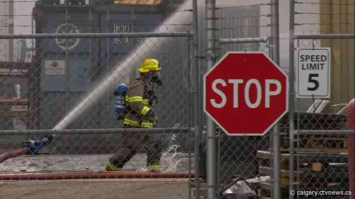 Firefighters face blaze at industrial building east of Calgary