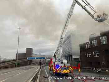 Newcastle Central Motorway reopens after fire as 8 arrested