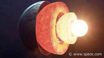 Swirls of liquid iron may be trapped inside Earth's 'solid' core