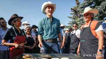 PM, Opposition leader and Alberta premier attend pancake breakfasts at Calgary Stampede