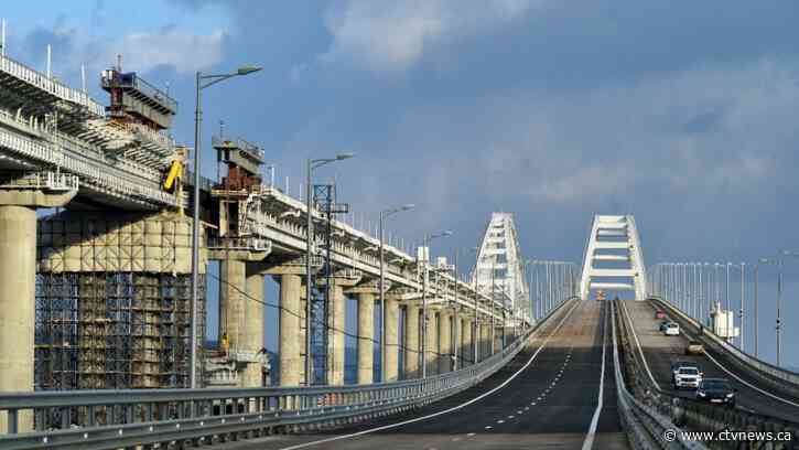 Russia reports intercepting a missile over annexed Crimea and briefly halts traffic on key bridge