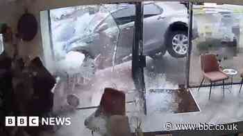 Moment car crashes into Sheffield hair salon