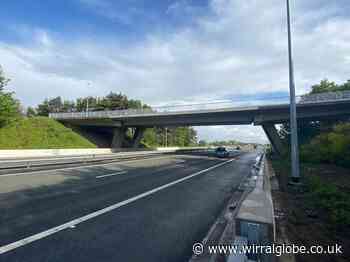 Car crashes into central barrier on M53