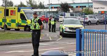 Wounded teacher leaves hospital as suspect remains in custody