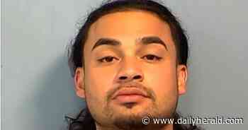 Gun crime parolee charged with fleeing and eluding police