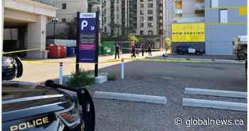 Suspects in custody after man suffering from gunshot wound found in downtown Calgary parking lot