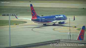 Sun Country passenger arrested after jumping out of emergency exit at MSP Airport