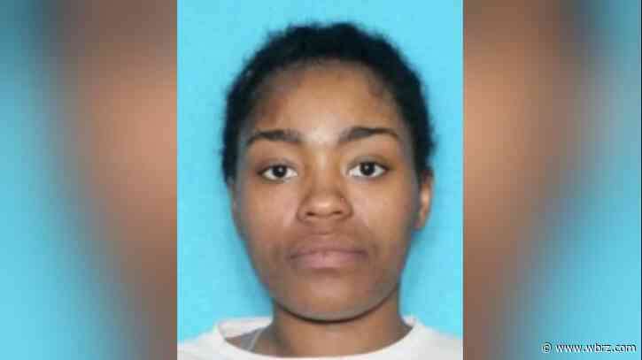 Woman arrested for attempted murder after shooting into car with one-year-old inside