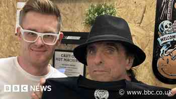 Alice Cooper pops into Manchester shop to buy Johnny Depp a T-shirt