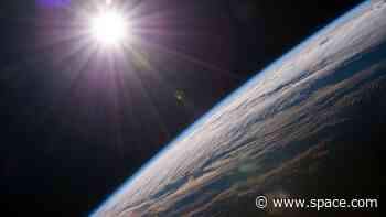 Why is Earth's day 24 hours long (and how did the sun keep it from being longer)?