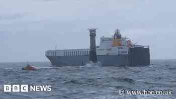 Stricken cargo ship at anchor in Falmouth harbour