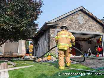 Edmonton fire investigators fight blaze at McTaggart home