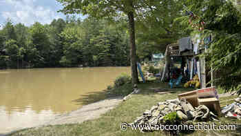 Connecticut man surveys flood damage at Vermont lake house