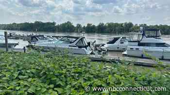 Docks break away from marina due to flooding in Glastonbury