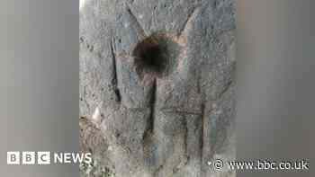 Archaeologists revisit mysterious carving site on Shropshire hill