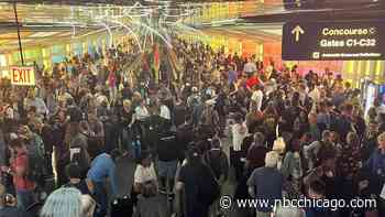 Video shows thousands of travelers taking shelter inside O'Hare Airport as tornado formed outside