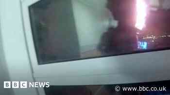 Moment police officer rescues men from Twinnell House