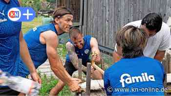 Teambuilding: Holstein-Kiel-Profis müssen Baumstämme durchsägen