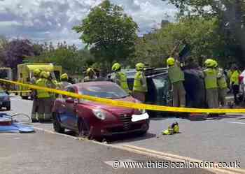 Three people hurt and car overturns in Chingford crash