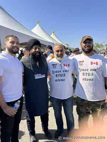 Poilievre’s office, Calgary MP silent over latest photo with controversial message