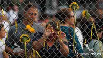 Hundreds attend vigil in honour of mother killed by stray bullet in Toronto shooting