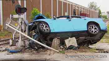 1 hospitalized after car collides with railroad crossing signal in NW Miami-Dade
