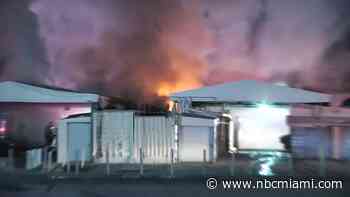 Crews battle flames at Swap Shop after ‘explosion' heard coming from metal containers