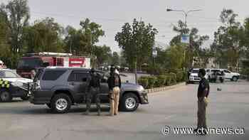 Suicide bomber targets truck carrying troops in northwestern Pakistan, wounding 8 people