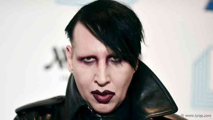 Marilyn Manson, accused of blowing his nose on videographer, to enter plea