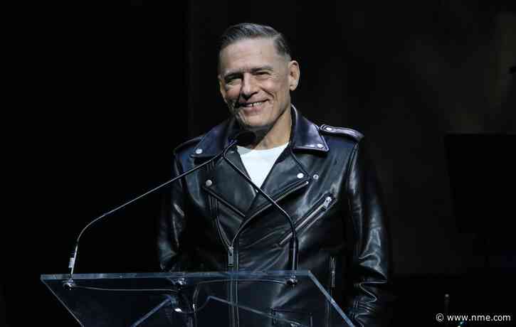 Watch Bryan Adams’ relaxed response after fan crashes stage to take microphone