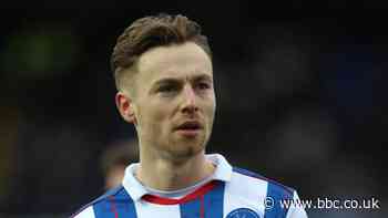 Dan Kemp: MK Dons midfielder signs for Swindon Town on loan