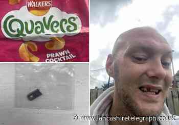 Man snapped tooth on 'metal zip' in packet of Quavers crisps