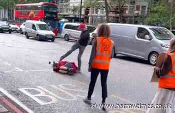 Just Stop Oil protestor punched and kicked by man in car accident