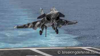India, France increase defense ties with new Rafale jet and submarine buys
