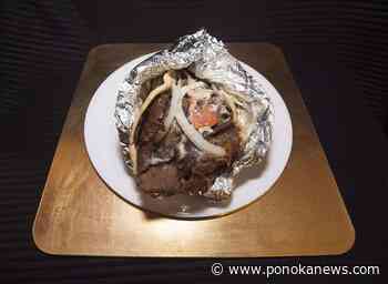 Bids climb as Alberta government auctions off ‘excellent, dusty’ donair suit