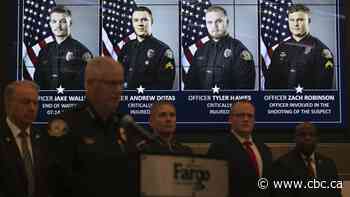 Gunman armed with heavy ammo and explosives cased scene before fatal attack on Fargo police