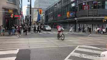 Should Ontario cyclists be allowed to cross on walk signals? Advocates speak out amid fines