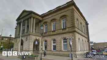 Lancashire councillor faces calls to resign over business debt